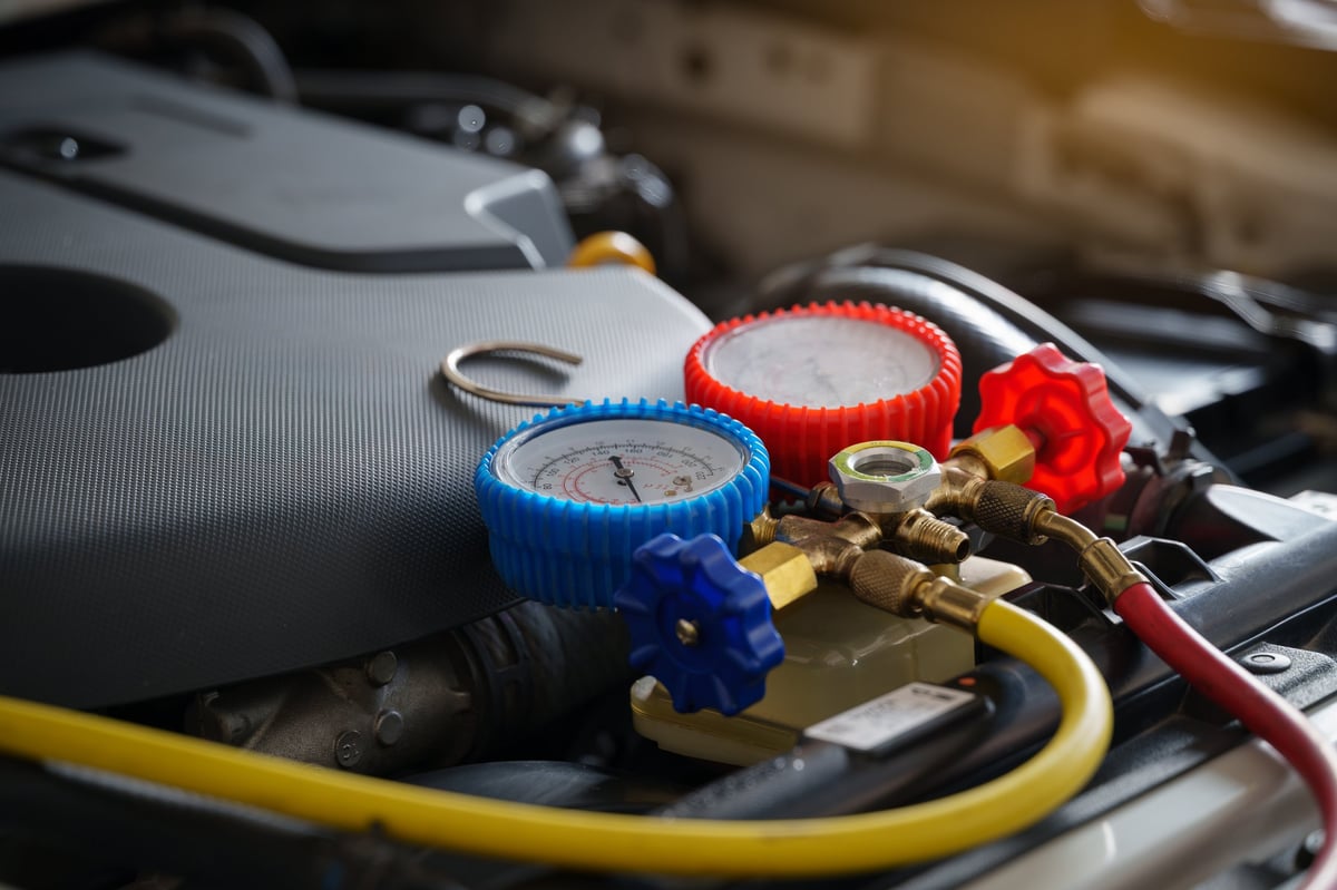 Car air conditioning system being checked and recharged at 1st Wheels Garage