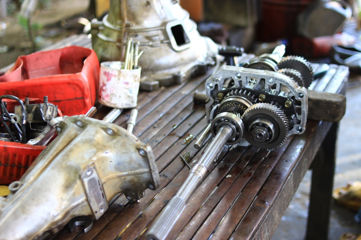 Suspension and drivetrain parts being replaced at 1st Wheels Garage